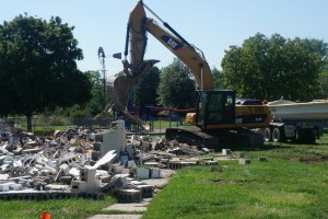 The bath house being taken down. Photo Credit/Denise Gilliland, Kat Country Hub