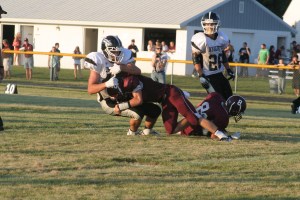 Marcus Hegy gets through the offensive line to pressure the quarterback.  Photo Credit/Steven Hosch