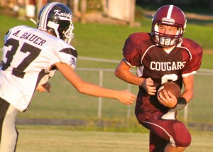 Cougars taking on Spalding. Photo Credit/Steven Hosch.