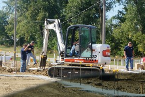 Jensen Plumbing employees working at the sight of the new pool. Photo Credit/Denise Gilliland, Editor and Chief, Kat Country Hub. 