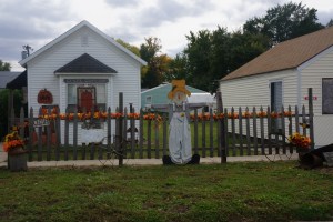 Houses ready for Halloween are Pedro's with the skeleton's in the yard, Tanksley's with the pumpkins and witch and Steinmeyer's with pumpkins and other Halloween goodies. The business is Craft Cottage in Lyons that is also ready for the holiday. Photo Credit/Denise Gilliland, Editor and Chief, Kat Country Hub.
