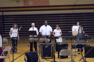 Northeast Drumline: Left to Right: Amelia Schlichting, Layne Miller, Director: John Mayo, Cassidy Mentink, and Kassandra Prieto Photo Courtesy LDNE.
