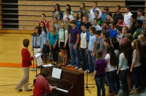 Cindy Blanc directs the O-C Senior Choir in one of the Patriotic songs of the day. Photo Credit/Denise Gilliland, Editor and Chief, Kat Country Hub.