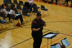 O-C Band Director Bryan Bohn announced each branch of the military during a song the band performed, and Veteran's stood as their branch was announced. Photo Credit/Denise Gilliland, Editor and Chief, Kat Country Hub.