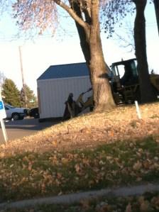 Traffic on Highway 77 came to a near stand still as Oakland's City Crew moved the K-9 Kennel to it's new location. at Oakland Officer JJ Johansen's house. 