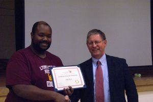 John Mayo being presented  his National Scholarship by Garry Sigle at LDNE. Left-John Mayo. Photo Courtesy of LDNE.