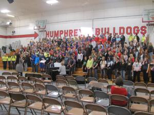 Students at Humphrey School for choir performance. Photo Courtesy LDNE.