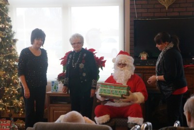 Mylet Kutchera, Jo Johnson and Jill Brink were Santa's Elves at Logan Valley Manor's Christmas Party. Photo Credit/Denise Gilliland, Editor and Chief, Kat Country Hub. 