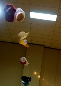 All types of hats hung from the ceiling at the fair kick-off. Photo Credit/Denise Gilliland, Editor and Chief, Kat Country Hub. 