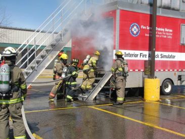 Daniel Jones in the white helmet, is one of the many firemen who attended fire school in Sioux City. Photo Courtesy of Susan Seery.