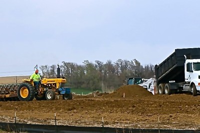 Crews are busy at the location for the new Dollar Store in Oakland.