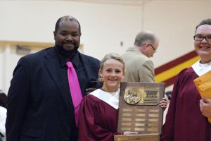 Sarah Alford Received the National Choral Award which is the highest choral award given.  L-R-John Mayo, Sarah Alford, Jessie Mutum. Photo Courtesy of LDNE.
