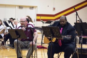 The Northeast Guitar Ensemble accompanied Northeast staff member Steve Hosch in "Here Comes The Sun" by The Beatles. Photo Courtesy of LDNE.