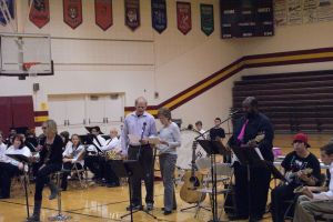 The Northeast Guitar Ensemble accompanied the No Name Singers for their rendition of "Hotel California." The No Name Singers are Northeast Staff Members from L-R Katie Mace (lead vocals), Paul Timm, (backup vocals), Pat Sharp (Back up vocals), John Mayo and students L-R Bailey Beaumont and Aaron Williams played guitar. Photo Courtesy of LDNE.