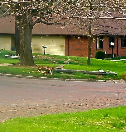 The light pole after moved off the roadway Saturday. Photo Credit/Denise Gilliland, Editor and Chief, Kat Country Hub.
