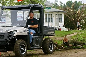 Tom and Kristie Jensen's son, Dylan, is pulling tree branches down the street from their house. Photo Credit/Denise Gilliland, Editor and Chief, Kat Country Hub.