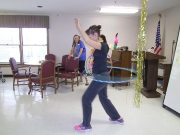 Oakland Heights employee Kim Schwetz hula hooping! Photo courtesy of Oakland Heights. 