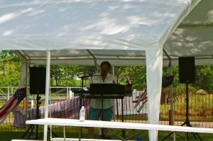 One Man Band performing at 4th of July celebration in Lyons. Photo Credit for both Denise Gilliland/Editor and Chief, Kat Country Hub.