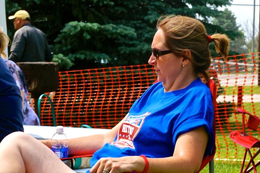 Julie Svendsen was among many watching the horseshoe tournament in Lyons on the 4th of July. Photo Credit/Denise Gilliland, Editor and Chief, Kat Country Hub.