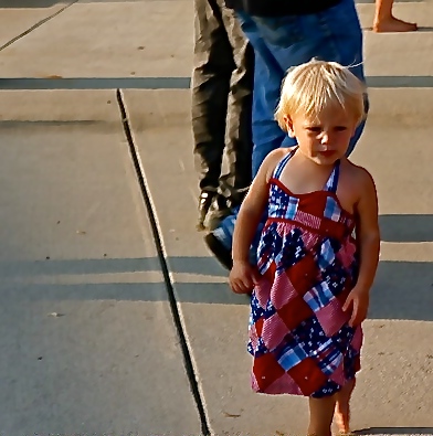 Miss Rennerfeldt is adoring in her patriotic red, white and blue dress at the Party in the Park. Photo Credit/Denise Gilliland, Editor and Chief, Kat Country Hub.