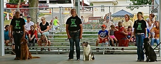 Sit and stay! All did well at the fair. Megan, Casey and Hayley are pictured here with the cute dogs! Photo Credit/Denise Gilliland, Editor and Chief, Kat Country Hub.