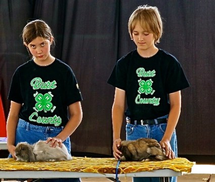 Trinity Seery and Cody Bachtell  and their rabbits that they have been preparing for this day. Photo Credit/Denise Gilliland, Editor and Chief, Kat Country Hub.
