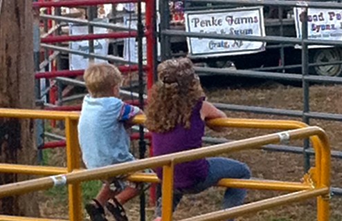 These bull riding fans sought to have the best view in the place! Photo Credit/Denise Gilliland, Editor and Chief, Kat Country Hub.