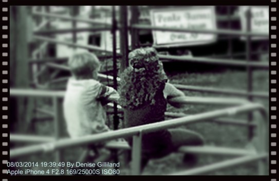 Carson Miller and Kassi Simonsen were fence side during the entire bull riding at the fair! Photo Credit/Denise Gilliland, Editor and Chief, Kat Country Hub.