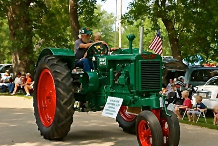 Tractors is to a parade as farming is to Nebraska! Sid Lindstrom and others drove their tractors in the 102nd Burt County Fair Parade.