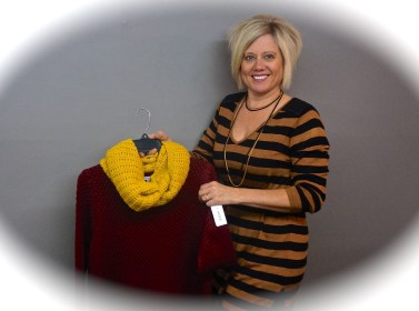 Lana Minton, owner of Lana a Boutique, is pictured holding one of her many clothing items. She is celebrating the second anniversary of her store in West Point. Photo Credit/Denise Gilliland, Editor and Chief, Kat Country Hub. 