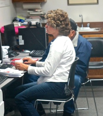 UNL Extension Assistant assists Delwin and Myrna Swanson at the Oakland Public Library with Medicare comparison. Both photos credit of Denise Gilliland, Editor and Chief, Kat Country Hub.