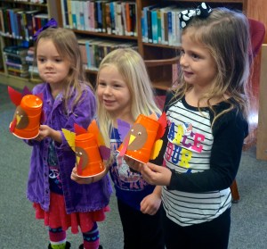 Laityn Johnson, Avery Christensen and Hilary Ray with the turkeys they made at the Oakland Library. Photo Credit/Denise Gilliland, Editor and Chief, Kat Country Hub. 