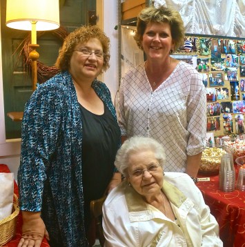 Sue Beckner, back right, Pat (Schold) Michael and June Schold celebrate Sue's 20 years of business. Pat is originally from Oakland and is June's daughter. Photo Credit/Denise Gilliland, Editor and Chief, Kat Country Hub.