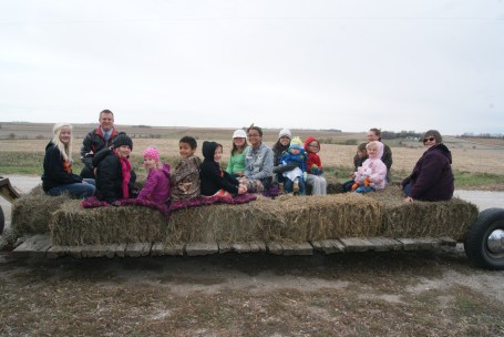 Craig Parish members enjoying a hay rack ride yesterday. Photo Credit/Mary Loftis. 