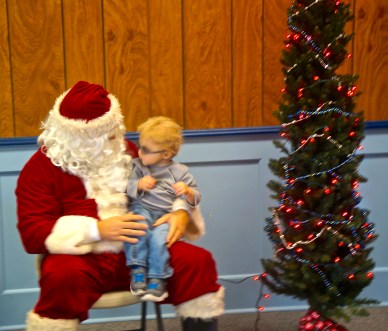 Landon Johnson visited Santa, telling him what he wants for Christmas. Photo Credit/Denise Gilliland, Editor and Chief, Kat Country Hub. 