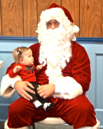 Bentley Olson sees Santa for the first time! Photo Credit/Denise Gilliland, Editor and Chief, Kat Country Hub. 