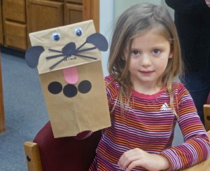 Making a puppy was fun for Hilary Ray at the Oakland library. Photo Credit/Denise Gilliland, Editor and Chief, Kat Country Hub.