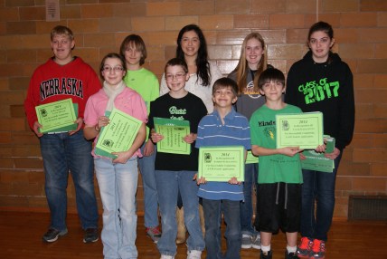 4-H Members Completing 4-H Awards Applications: Back Row: Layne Miller, Cody Bachtell, Ashley Bohannon, Leia Farrens and Amelia Schlichting; Front Row: Faith Roscoe, Paul Roscoe, Andrew Schlichting and Caleb Schlichting. Photo Courtesy of Mary Loftis.   
