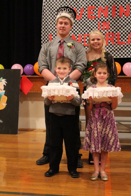 Winter Dance King and Queen Justin Smith and Shelby Greve. Crown bearers Eli Johnson and Brinley Eriksen. Photo Credit/Cindy Dahlquist.