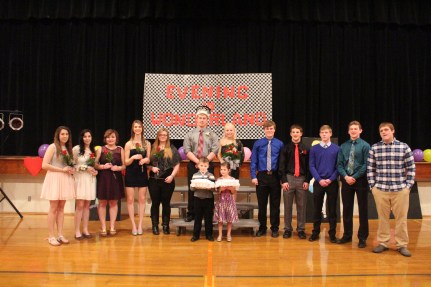 The O-C Winter Dance Candidates were: -  Left to Right  Alex Moore, Nicole Moore, Anita Potts, Heather Riedy, Angela Weisbrook, King Justin Smith and Queen Shelby Greve, Ted Maline, Nick Arlt, Michael Fischer, Joel Johnson, and Blake Uhing Crown Bearers:  Eli Johnson and Brinley Eriksen.  Photo Credit/Cindy Dahlquist. 