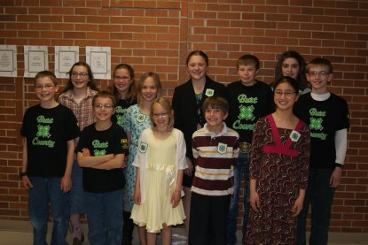 4-H Speech Contest participants included: Paul Roscoe, Faith Roscoe, John Roscoe, Elise Anderson, Arianne Brokaw, Miriel Brokaw, Ellie Glup, Andrew Schlichting, Brayden Anderson, Rayna Hladky, Amelia Schlichting and Michael Bracht. Not pictured is: Caleb Schlichting.  Photo Credit/Mary Loftis.