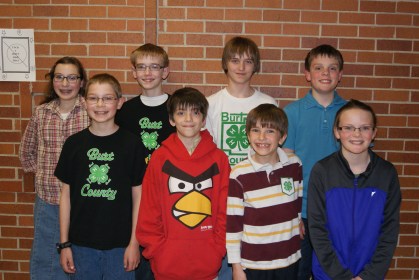 All smiles after participating in the 4-H Public Service Announcement Contest were: Faith Roscoe, Paul Roscoe, Michael Bracht, Caleb Schlichting, Cody Bachtell, Andrew Schlichting, Lucas Niewohner and Hayley Niewohner. Photo Credit/Mary Loftis.
