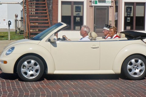 Jim Groth drove the Oakland Swedish Festival King and Queen, Ed and Betty Hanna, through the Swedish Festival Parade. Photo Credit/Denise Gilliland, Editor and Chief, Kat Country Hub. 