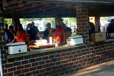 Many workers provide a delicious meal of barbecued beef sandwiches along with side dishes to several people after the fair parade. This has been a tradition for years! All photos credit of Denise Gilliland, Editor and Chief, Kat Country Hub. 