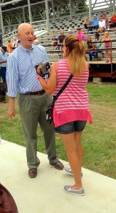 Denise Gilliland, Editor and Chief of Kat Country Hub, was honored to meet Governor Pete Ricketts Monday evening when he came to declare Burt County Livestock Friendly. The picture isn't the best, my husband took it and doesn't care to use my good camera and I didn't know he was going to take one with his phone or I would have set it up. But, I am thrilled to be in a picture with him at any rate. I introduced myself as the Oakland City Council President and said how honored we all are to have him attend the fair and for the reason he did. He saw my election sticker on my blouse and wished me well upon being elected in November! What a thrill! Photo Credit/Jeff Gilliland. 